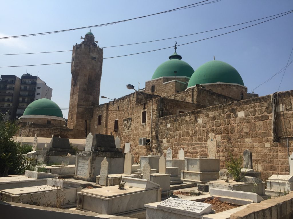 cemetery in front of old mosque